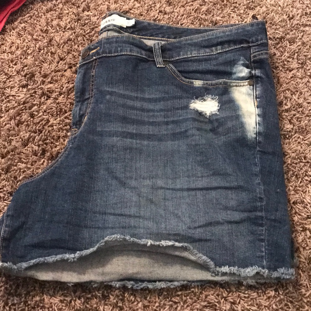 Destroyed denim shorts